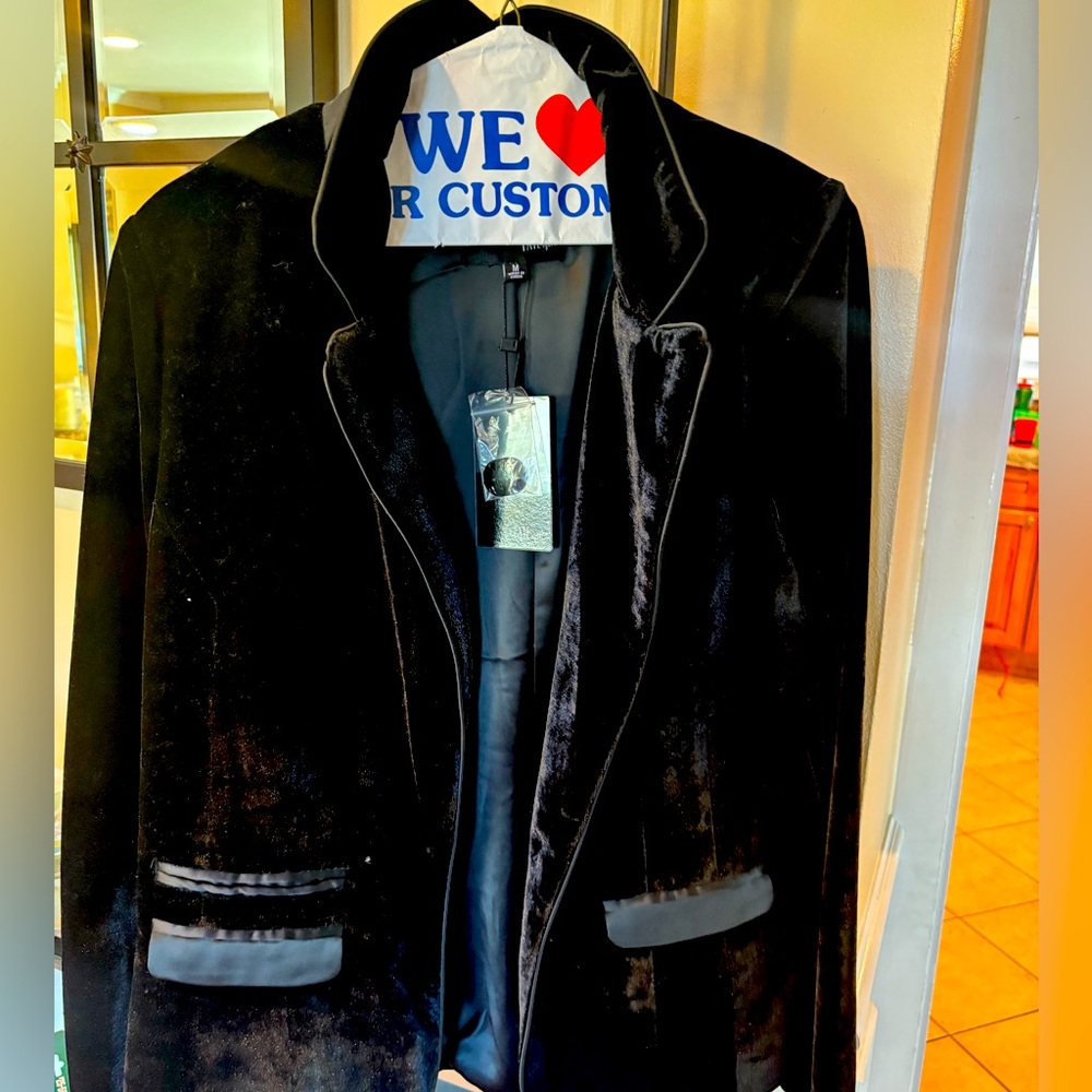 Women’s velvet black blazer. Never worn with tags. Originally $98 but paid $49